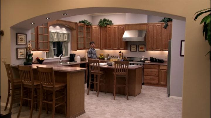 Michael returned to the model home  to find his son in the kitchen.