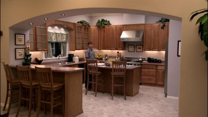 Michael returned to the model home  to find his son in the kitchen.