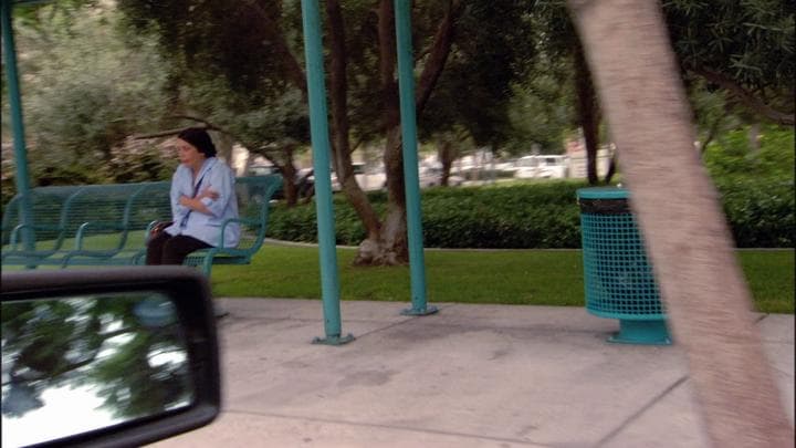 and that's when he recognized his mother's  fill-in housekeeper at a bus stop.