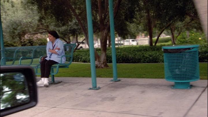 and that's when he recognized his mother's  fill-in housekeeper at a bus stop.