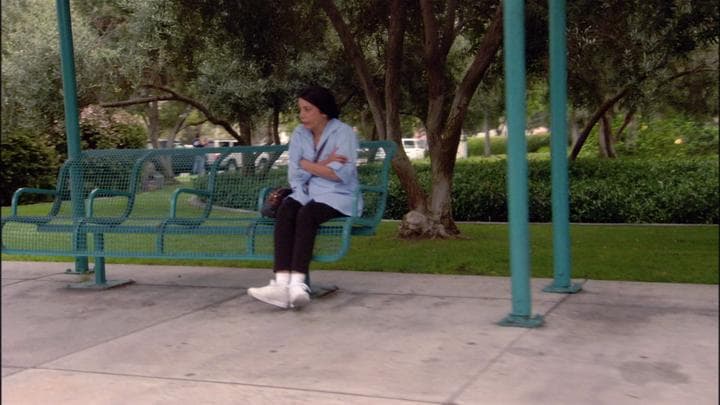 and that's when he recognized his mother's  fill-in housekeeper at a bus stop.