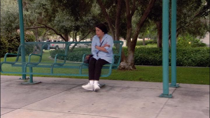 and that's when he recognized his mother's  fill-in housekeeper at a bus stop.