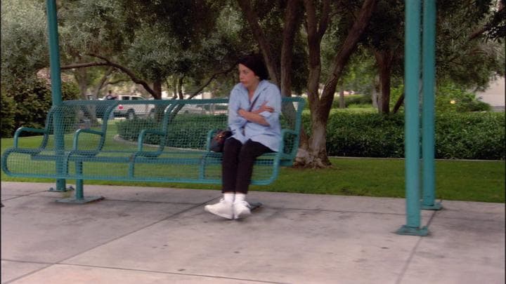 and that's when he recognized his mother's  fill-in housekeeper at a bus stop.