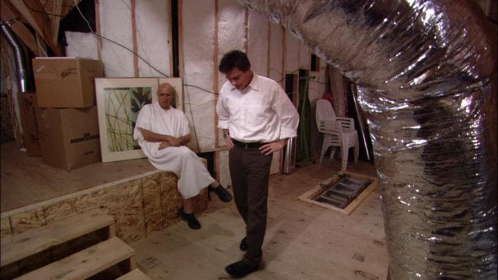 In the attic,  Michael met with George Sr...