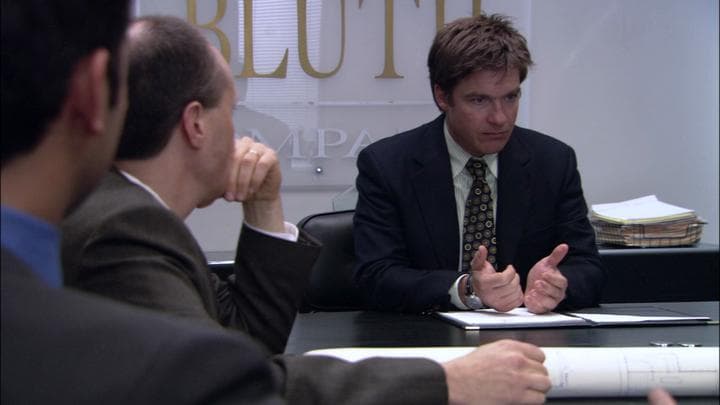 Michael then went to the office,  where he ran into Gob.